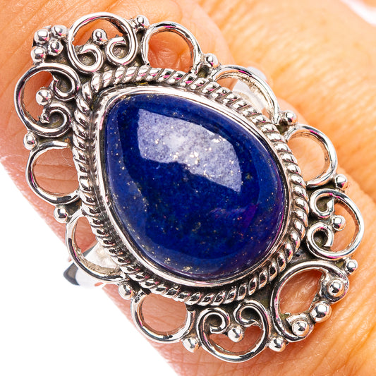 Sterling silver lapis lazuli ring with oval blue stone and ornate filigree setting