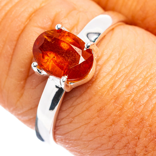 Orange kyanite ring with faceted oval gemstone in 925 sterling silver setting