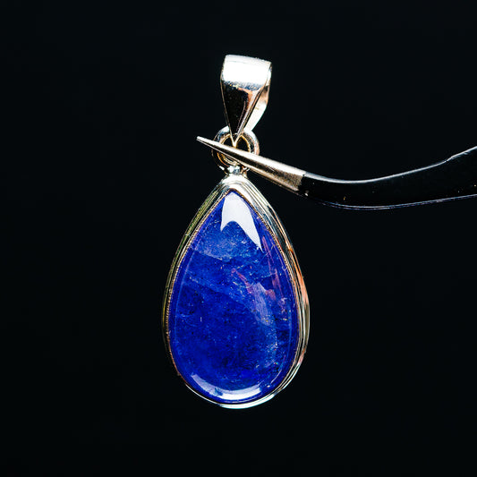 Sterling silver teardrop tanzanite pendant with blue gemstone set in a bail