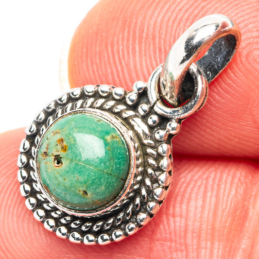 Dainty sterling silver pendant with round green cabochon stone and loop bail