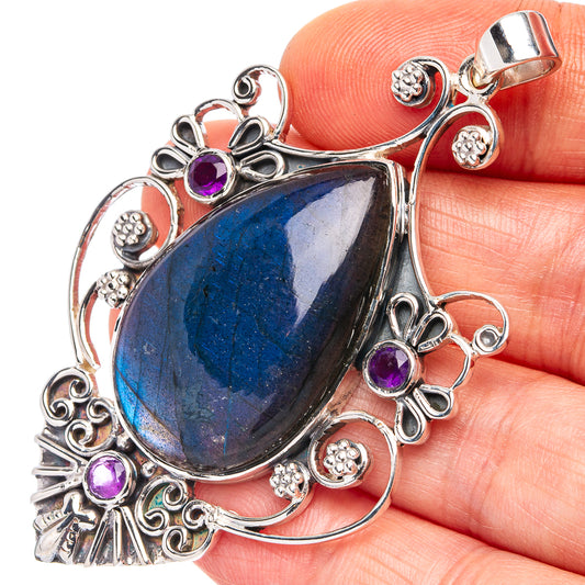 Sterling silver labradorite pendant with teardrop blue stone and purple amethyst accents