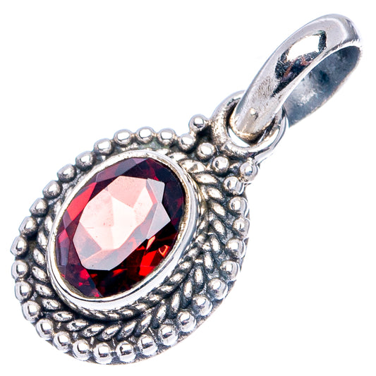 Sterling silver garnet pendant with prong-set oval red gemstone and raised bead border
