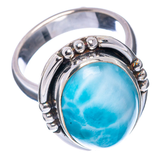 Sterling silver Larimar ring, side view of oval blue marbled stone in bezel setting