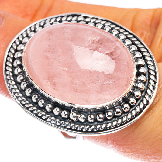 Oval pink morganite cabochon sterling silver ring with beaded halo, size 6.