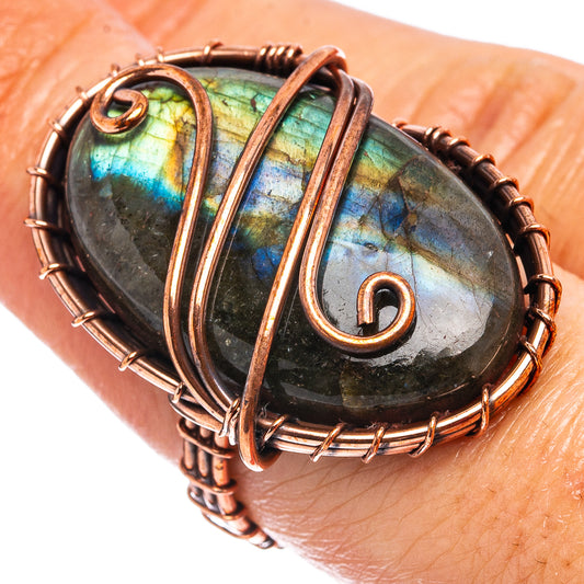 Labradorite wire-wrap ring with oval stone in oxidized copper wire, close view