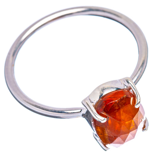 Orange kyanite oval sterling silver ring with raised bezel-like prong setting
