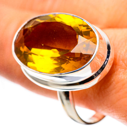 Oval faceted citrine gemstone ring in 925 sterling silver, shiny polished band