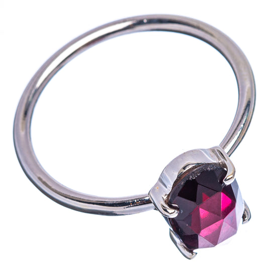 Sterling silver garnet ring with faceted dark red gemstone, size 8.75