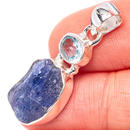 Sterling silver pendant with raw deep-blue tanzanite and blue topaz cabochon