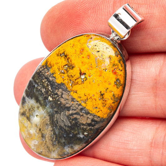 Bumblebee jasper oval pendant in .925 sterling silver bezel, top bail visible