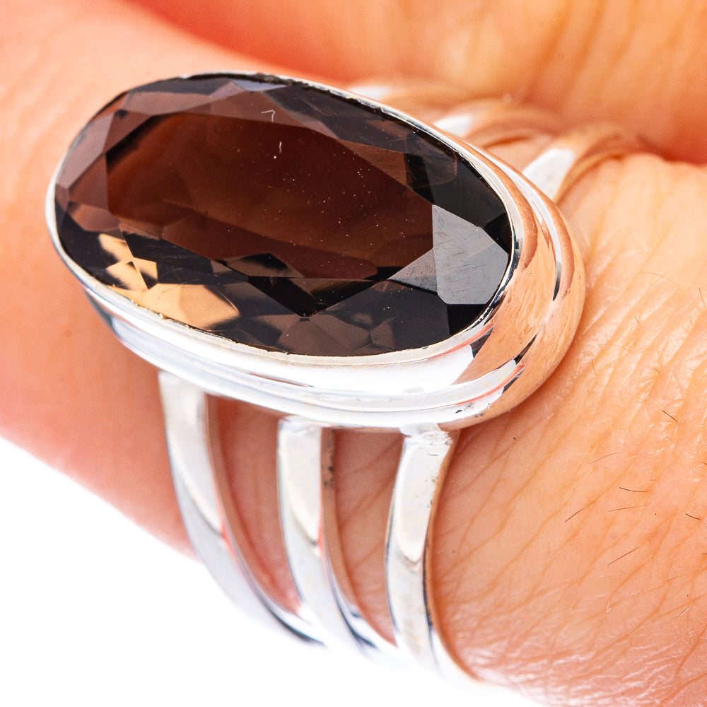 Smoky quartz oval ring with faceted dark stone in 925 sterling silver band