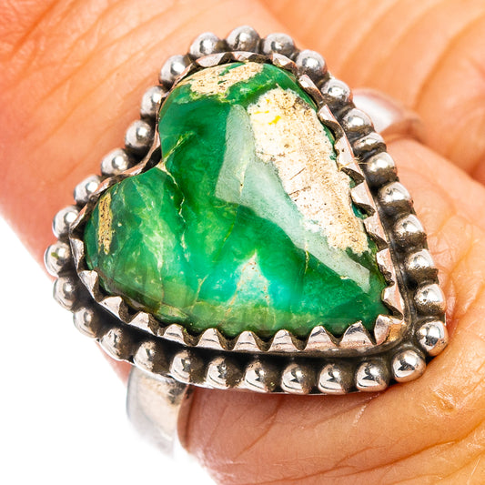 Sterling silver ring with oval green turquoise nugget and beaded bezel