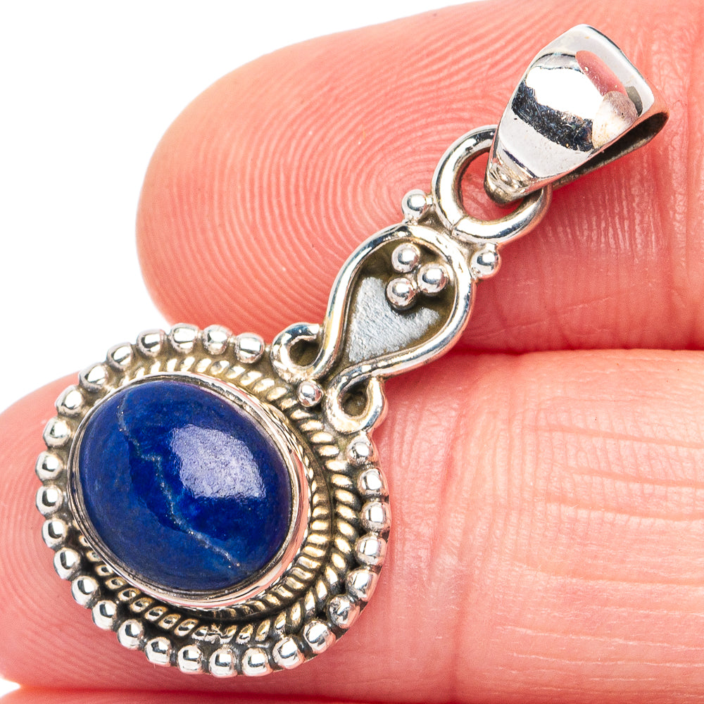 Round lapis lazuli pendant in 925 sterling silver, blue stone with ornate silver frame