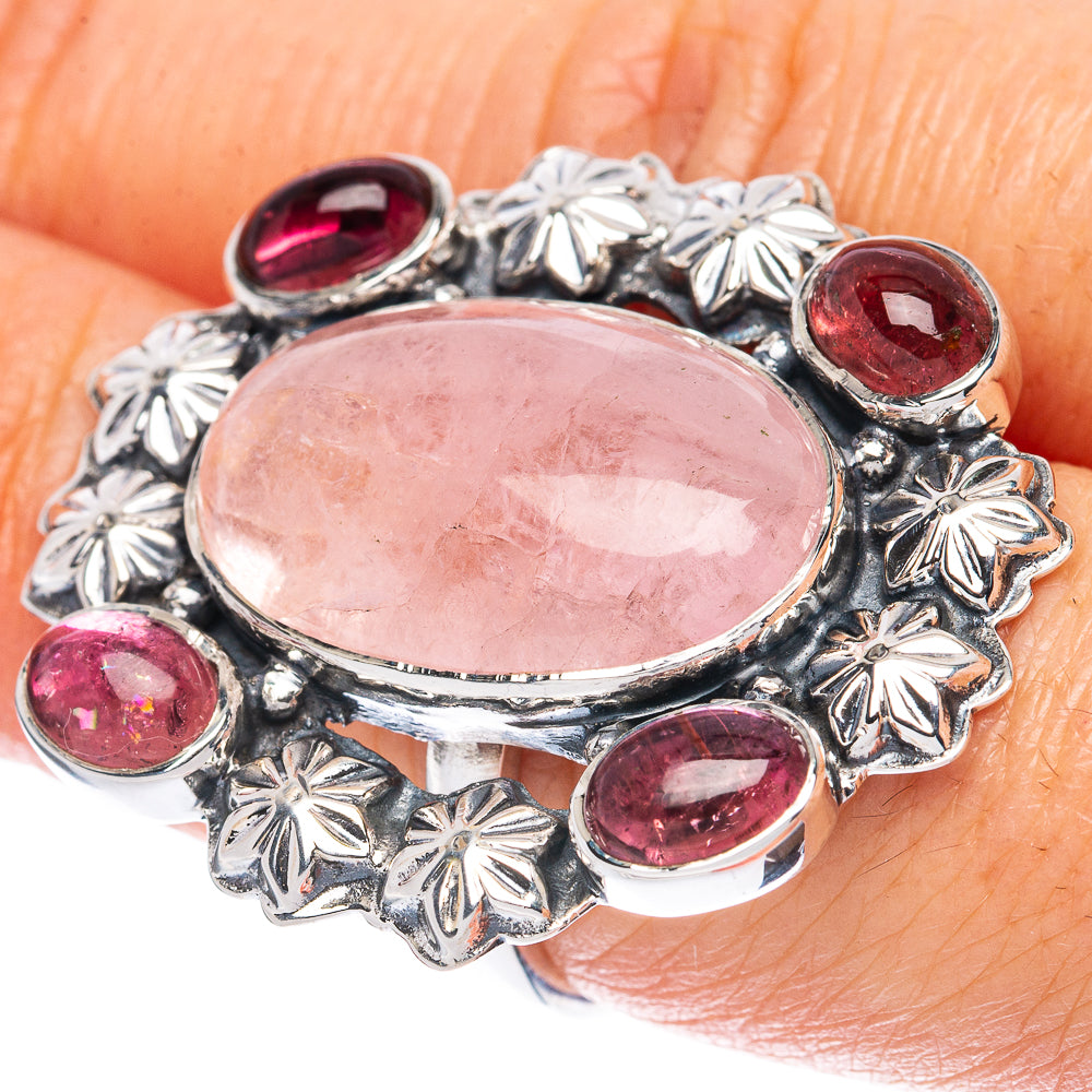 Sterling silver oval pink center ring with pink round side gemstones