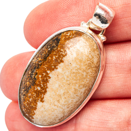 Sterling silver picture jasper pendant with oval brown-and-cream stone and open bail
