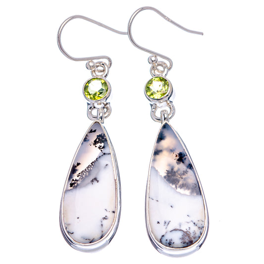 Sterling silver hook earrings with round peridot drops and white dendritic opal teardrops.