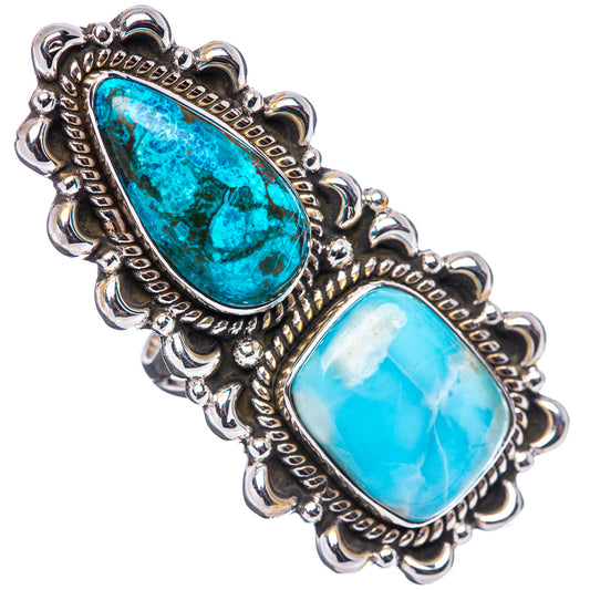 Sterling silver cuff-style ring with two oval blue-green cabochon gemstones and scalloped edge