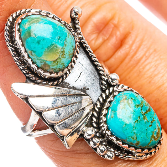 Native Style Mohave turquoise ring with two oval stones, rope border and arrow-like silver design