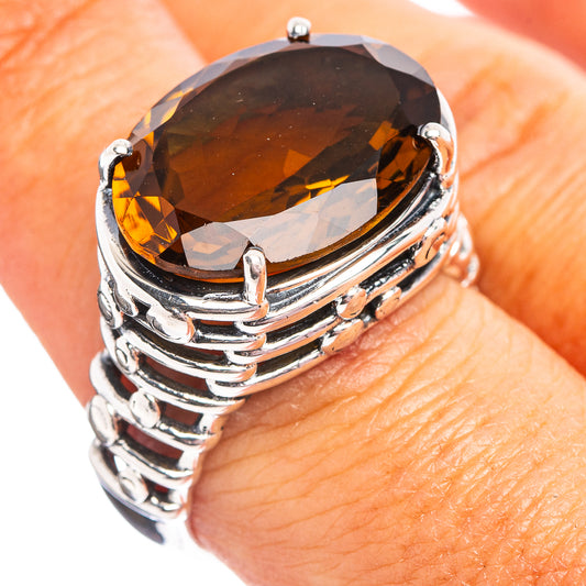Oval faceted amber quartz ring with ridged .925 sterling silver band, size 8