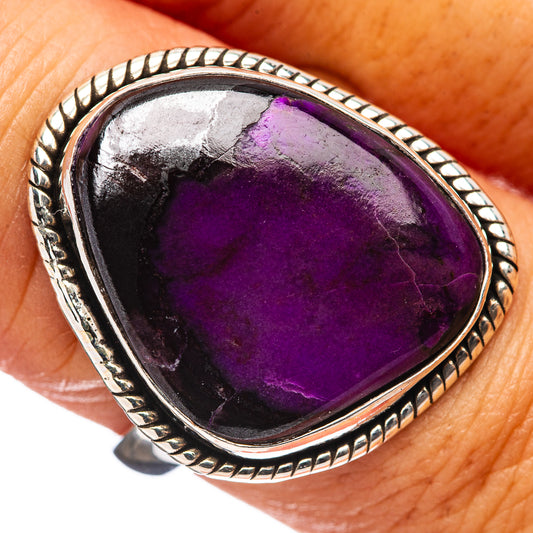 Sterling silver sugilite ring with oval purple gemstone and braided bezel