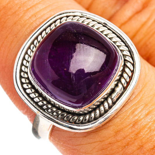 Amethyst gemstone ring with purple cabochon and ornate .925 sterling silver band, size 8