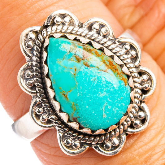 Sterling silver turquoise oval ring with ornate border, size 7.25