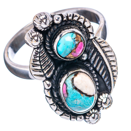 Sterling silver turquoise ring with two oval inlays, pink and white accents, detailed band