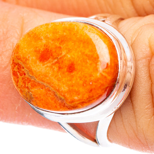 Sterling silver ring with orange sponge coral oval cabochon, size 5