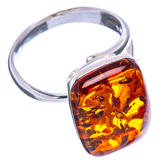 Amber teardrop cabochon set in 925 sterling silver adjustable ring band