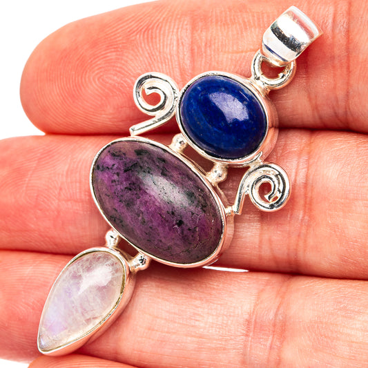 Sterling silver gemstone pendant with blue, purple, and pale pink oval stones