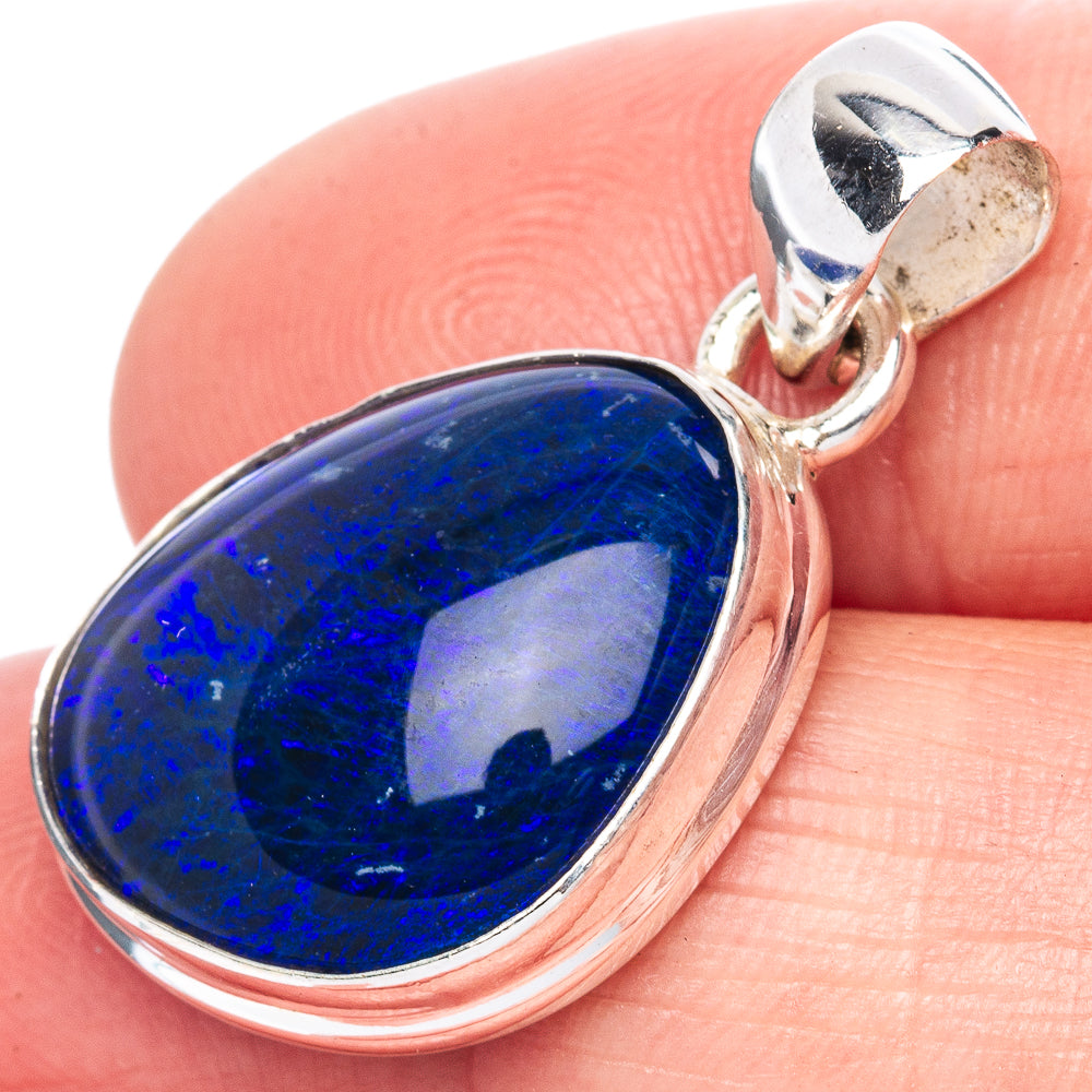 Sterling silver oval opal pendant with deep blue stone and split-prong bail