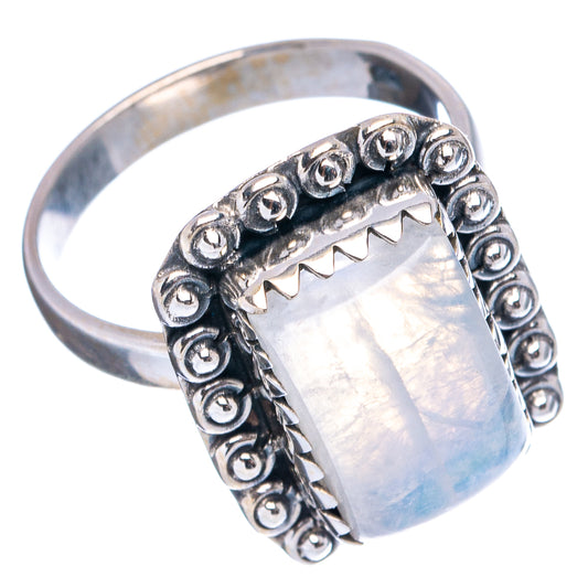 Sterling silver moonstone ring, wide band with scalloped bezel and iridescent light-blue stone