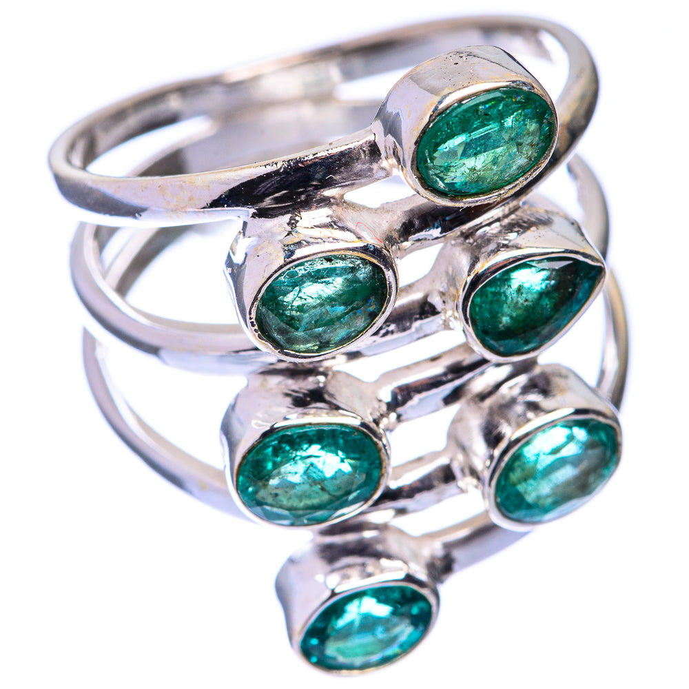 Sterling silver ring with oval green emerald cabochon stones, side view