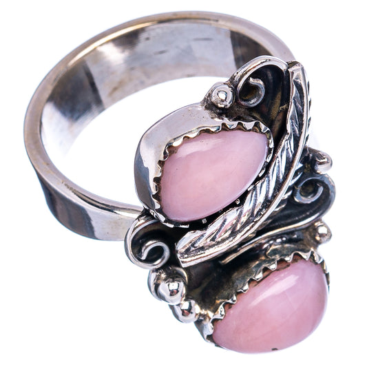 Sterling silver opal ring with two pink teardrop stones and ornate side setting