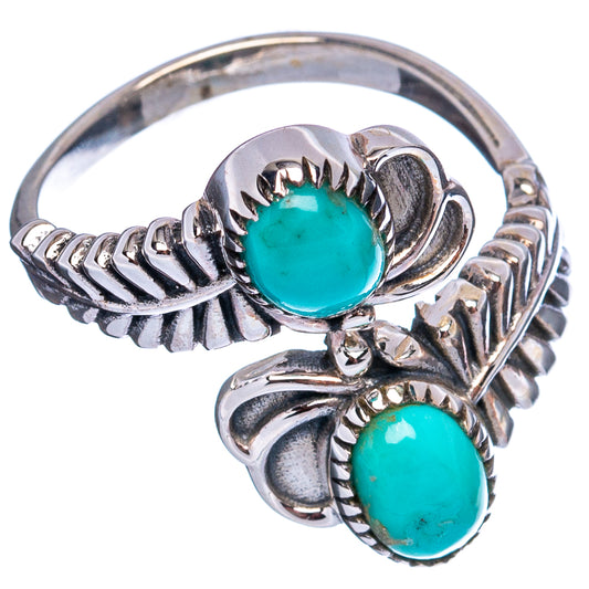 Turquoise cabochon sterling silver ring with floral side details and oval turquoise stones
