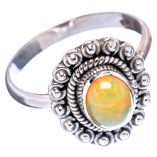 Sterling silver opal ring with round multicolor cabochon and ornate bead bezel