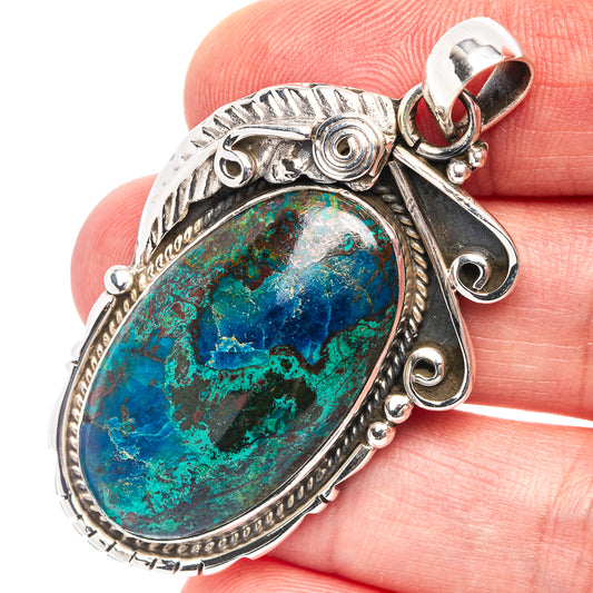 Sterling silver oval pendant with blue-green malachite gemstone and bail