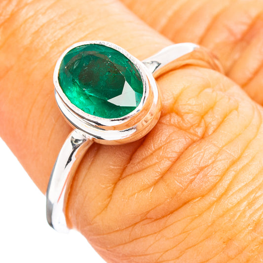 Sterling silver ring with oval green gemstone bezel setting, size 6