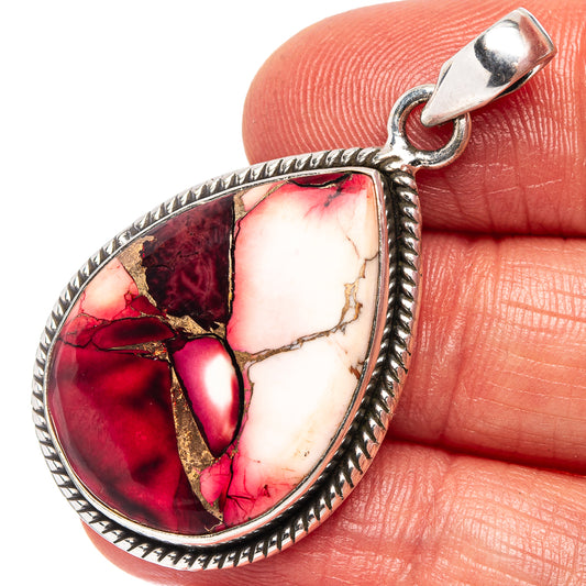 Red and white teardrop turquoise pendant with braided silver bezel bail