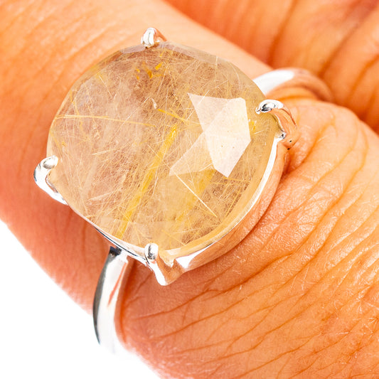 Rutilated quartz faceted ring in sterling silver with four-prong setting