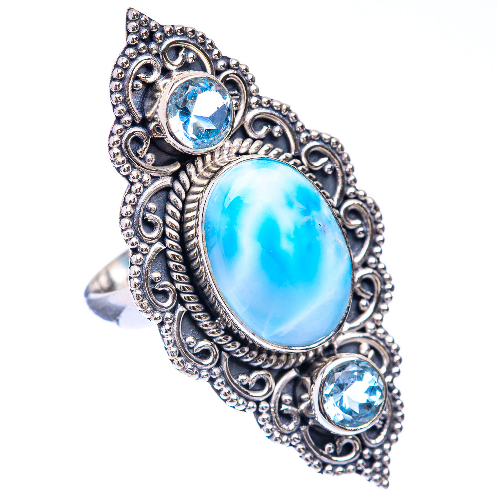 Sterling silver ring with large oval light-blue cabochon, round blue side stones, size 6.5