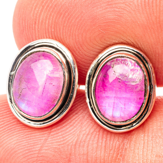 Oval pink moonstone stud earrings in .925 sterling silver bezel, close-up detail
