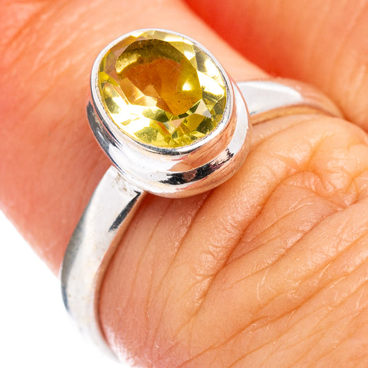 Faceted lemon quartz ring in .925 sterling silver, round yellow gemstone close-up