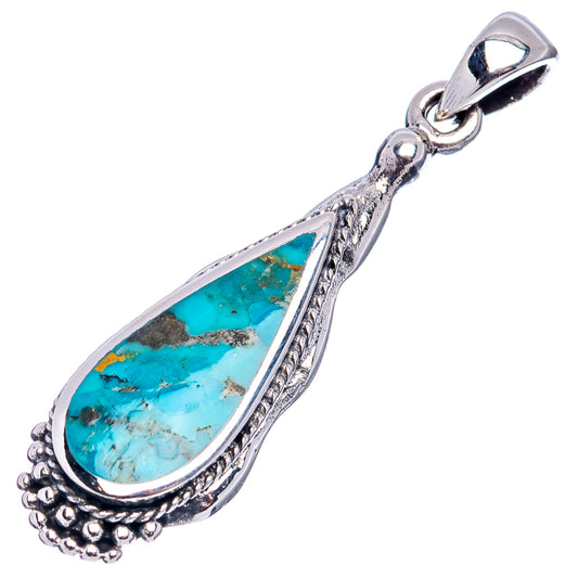 Turquoise teardrop .925 sterling silver pendant with textured frame and top bail