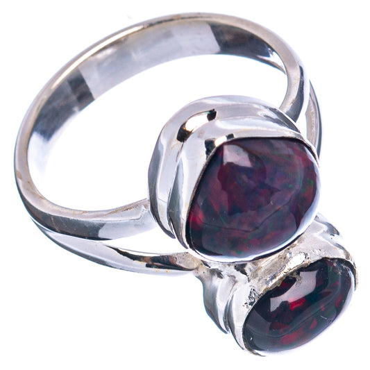 Sterling silver ring with two oval black opal stones, curved band view