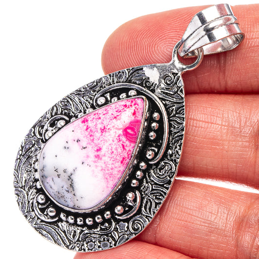 German silver teardrop pendant with pink & white dendritic opal, ornate bezel and bail