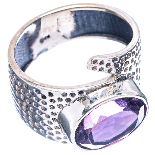 Amethyst sterling silver ring, hammered band texture and purple oval stone, side view