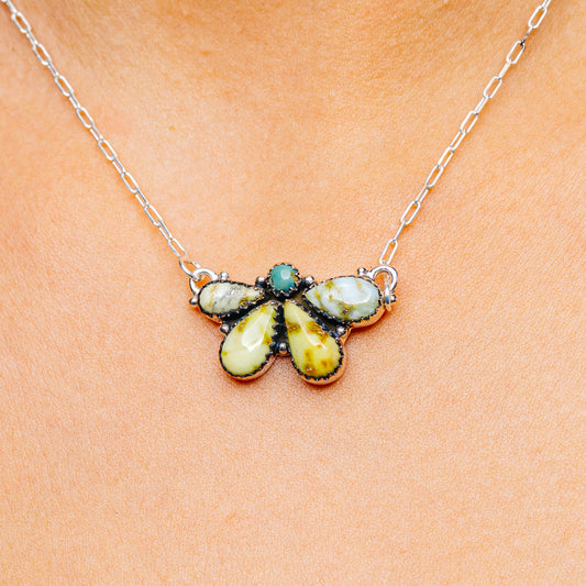 Sterling silver turquoise pendant necklace with butterfly-like cabochon stones