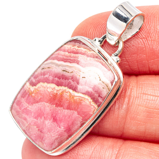 Sterling silver rhodochrosite pendant with pink striped stone cabochon and bail