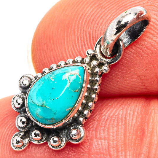 Turquoise teardrop pendant with sterling silver scalloped bezel and bead details